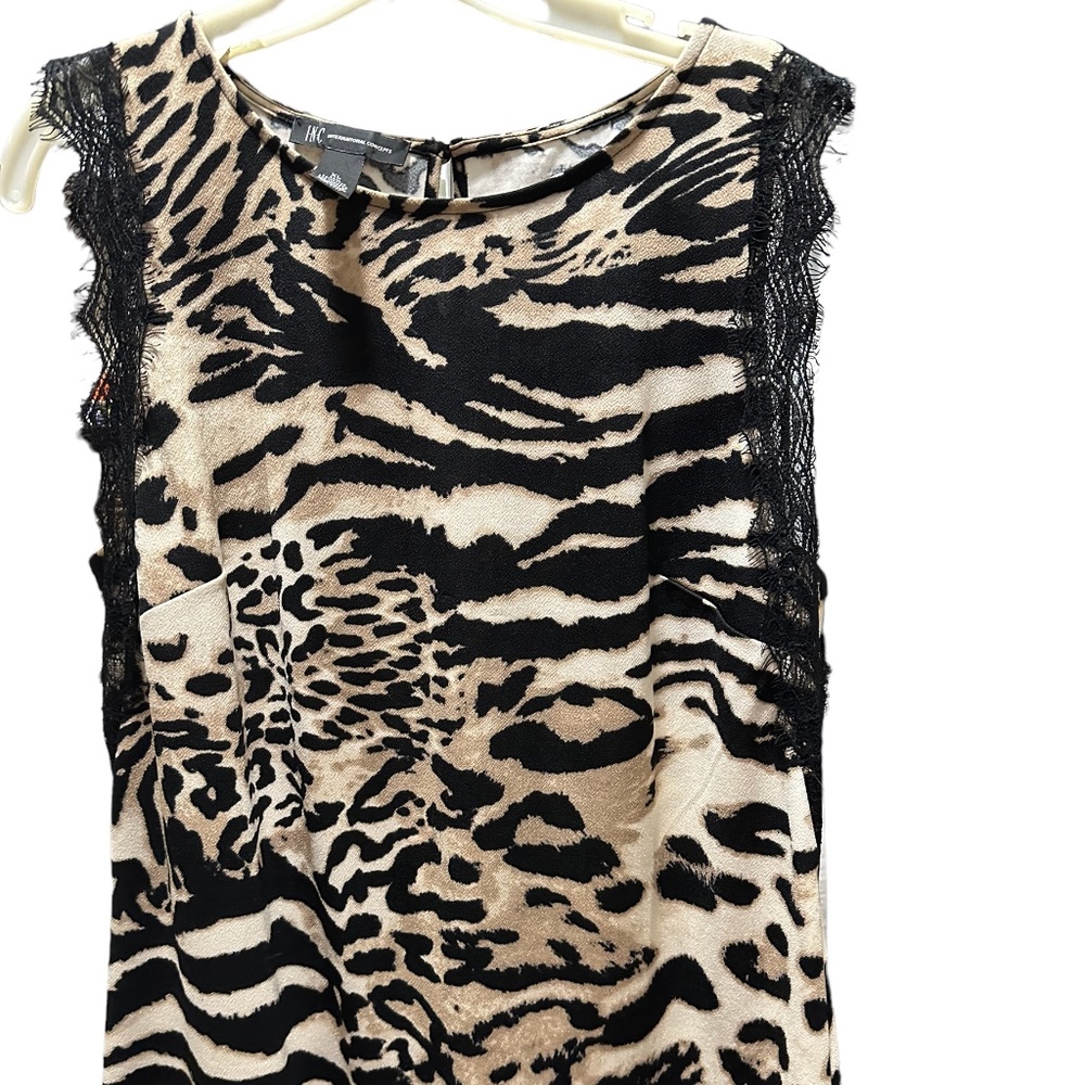 Animal print sleeveless top with lace accents Inc Incorporated